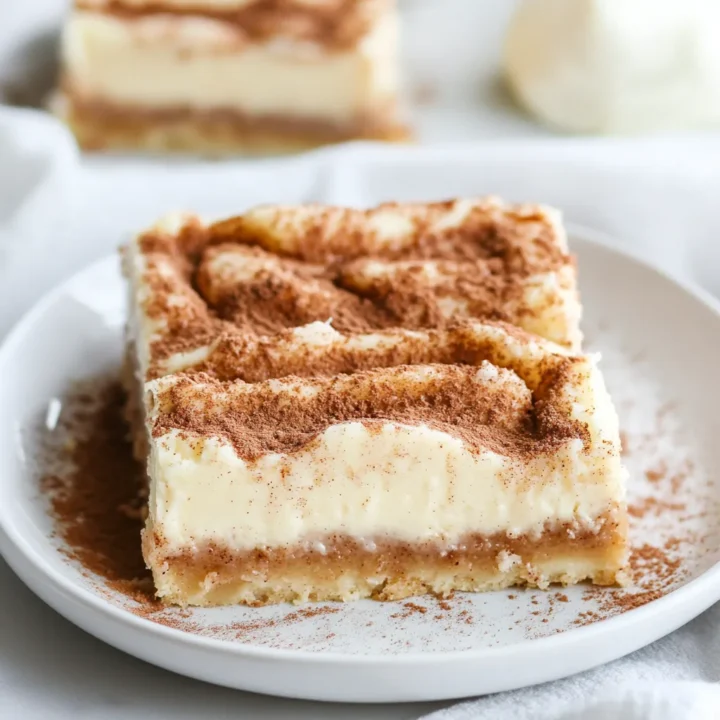 Creamy Cinnamon Roll Cheesecake Bars